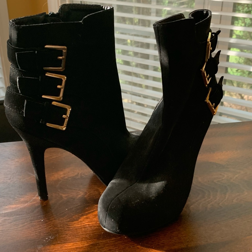 Madeline Girl faux suede black stiletto
booties. 3 strap gold buckle design